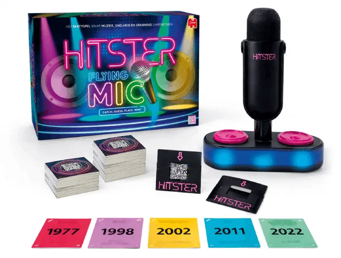 Hitster Flying Mic box with the flying microphone on its base, QR music cards, and colored year cards